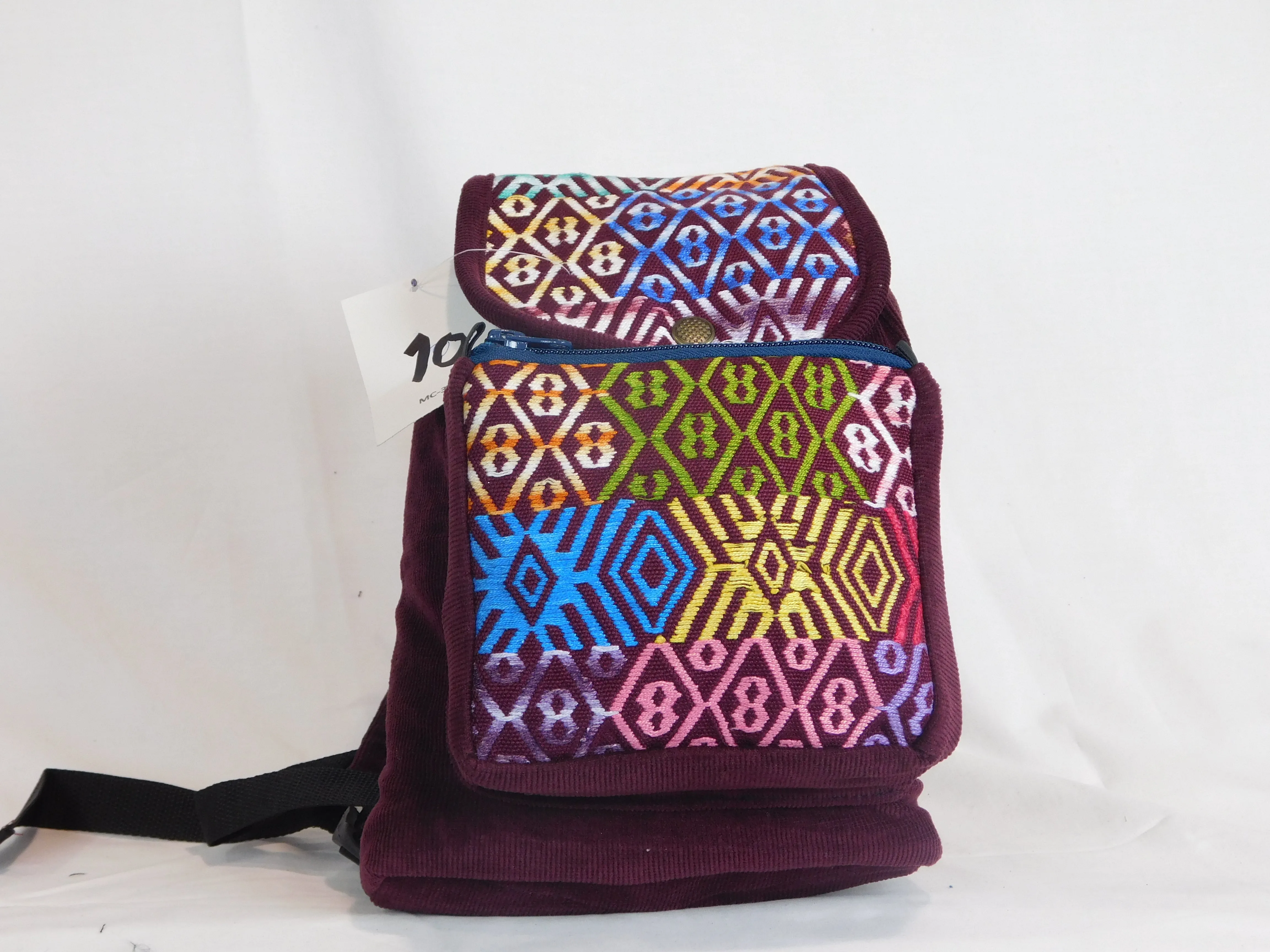 Mini backpack in corduroy with hand brocaded accents
