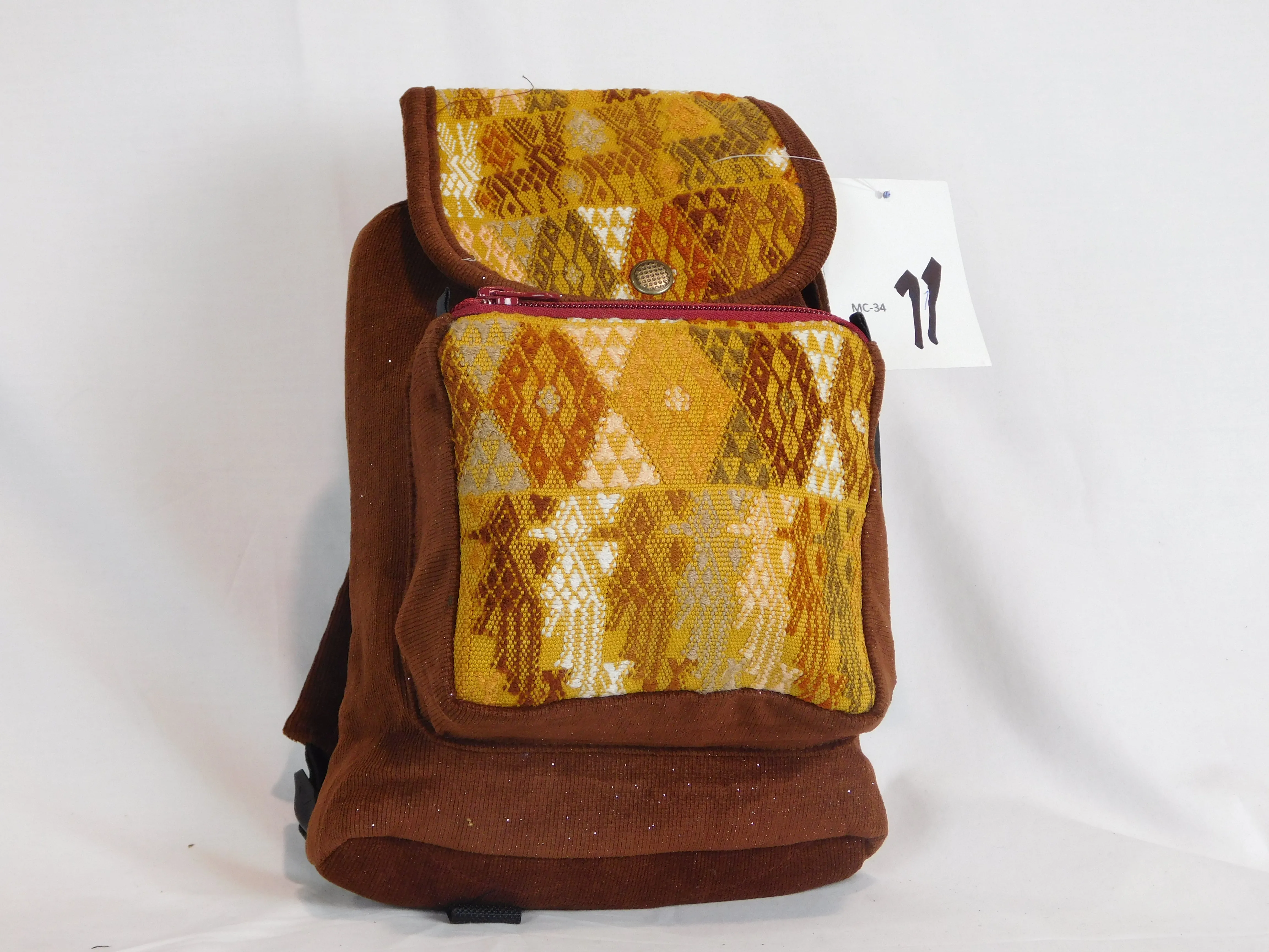 Mini backpack in corduroy with hand brocaded accents