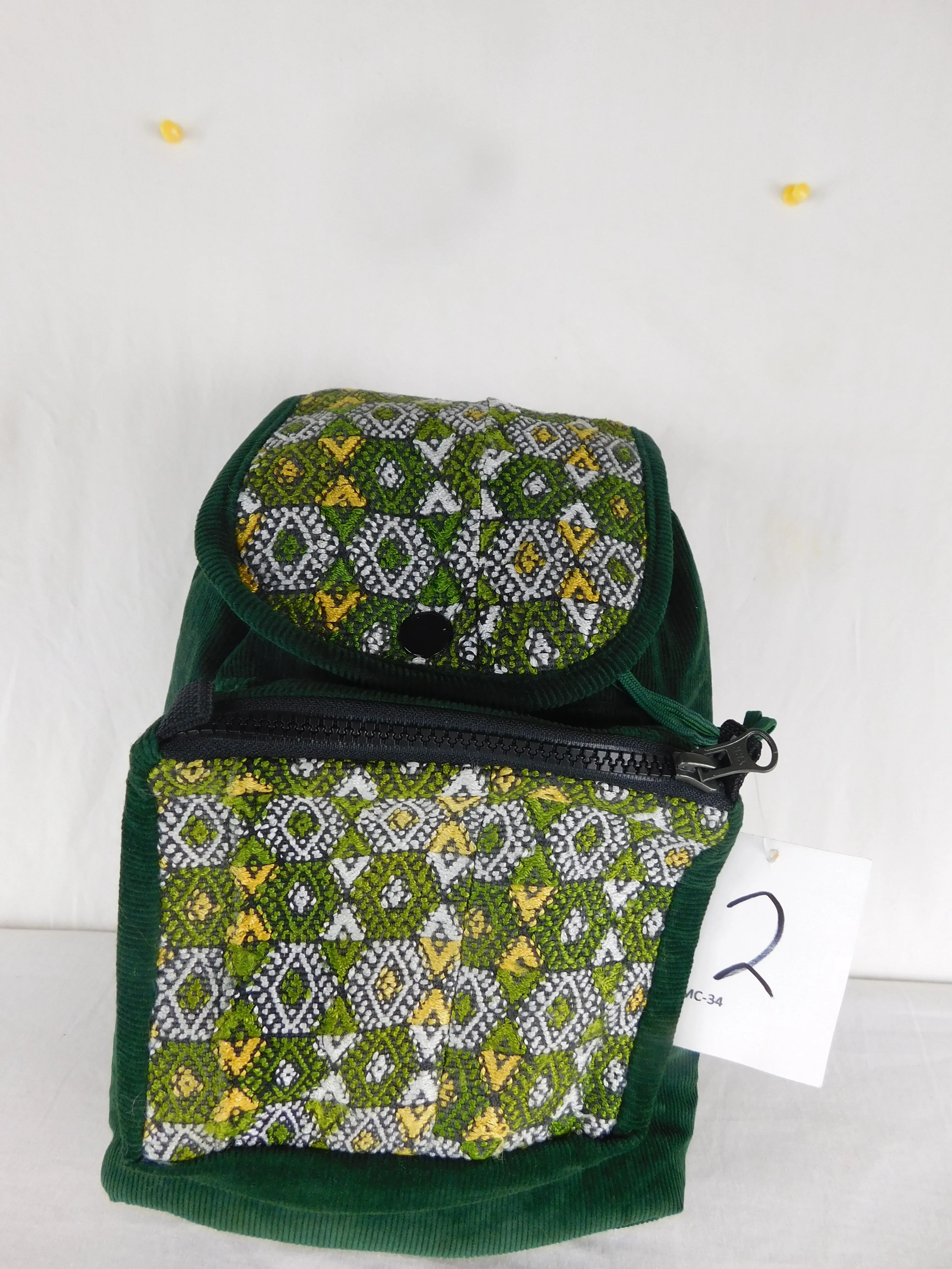 Mini backpack in corduroy with hand brocaded accents