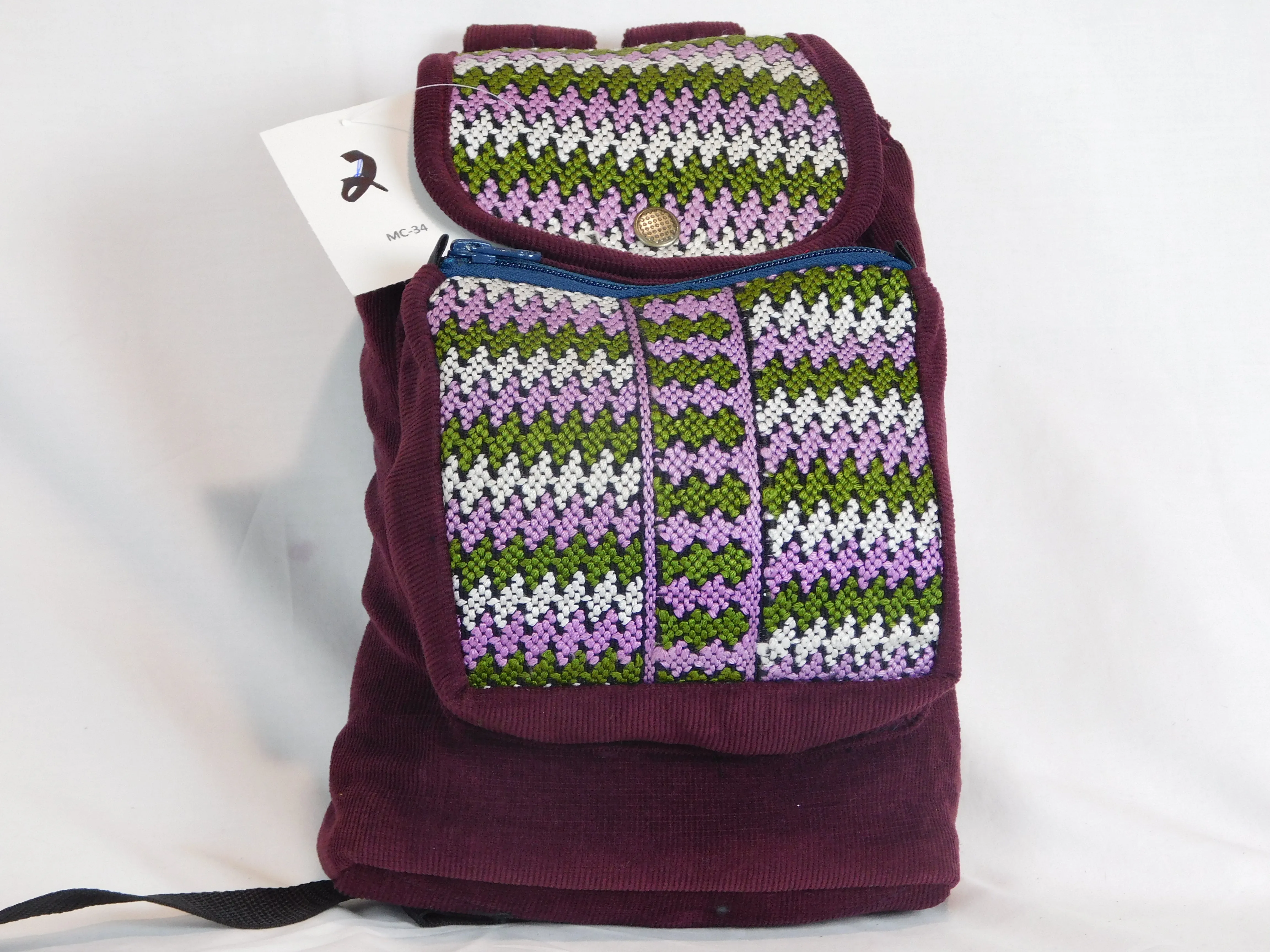 Mini backpack in corduroy with hand brocaded accents