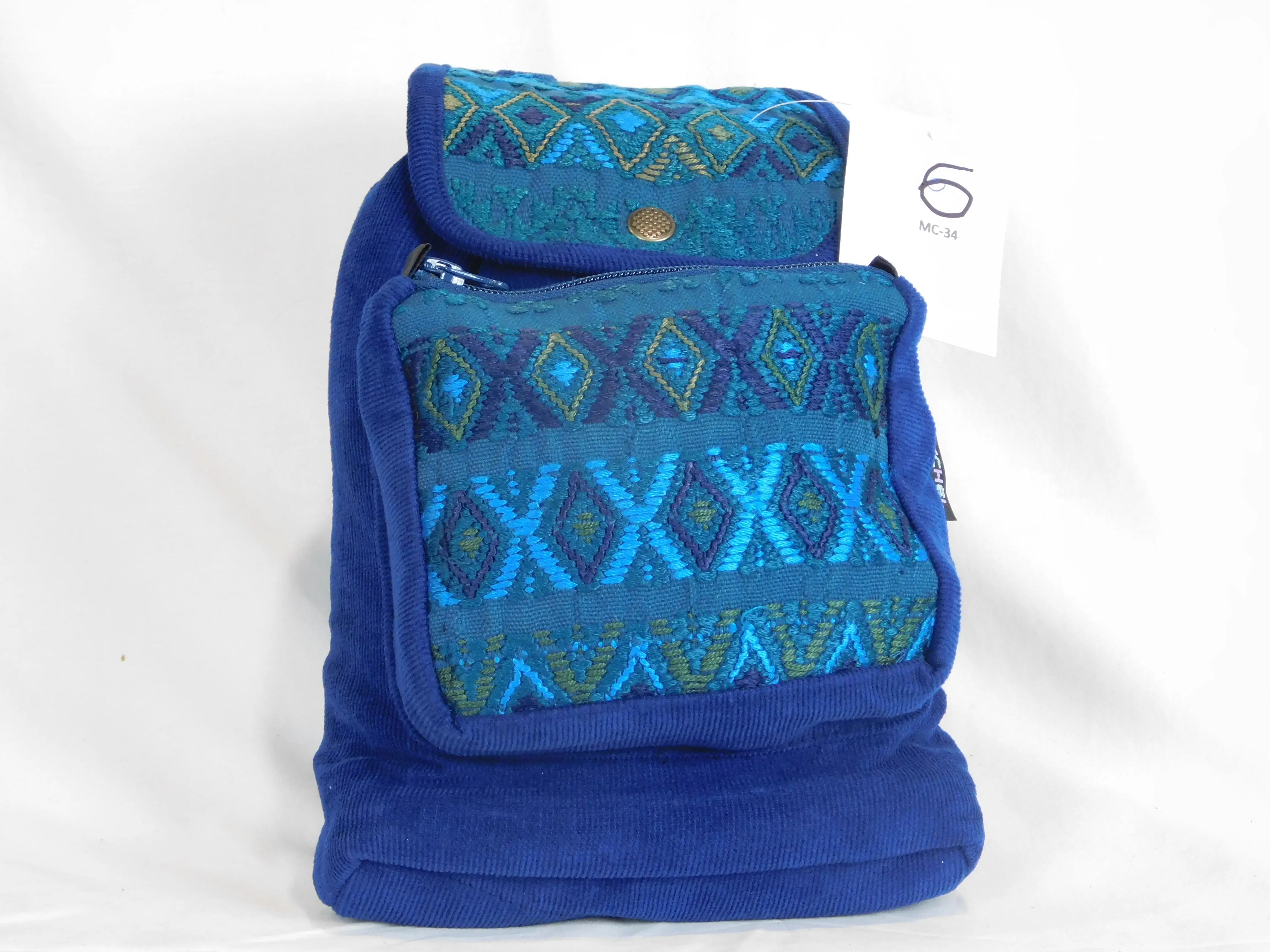Mini backpack in corduroy with hand brocaded accents