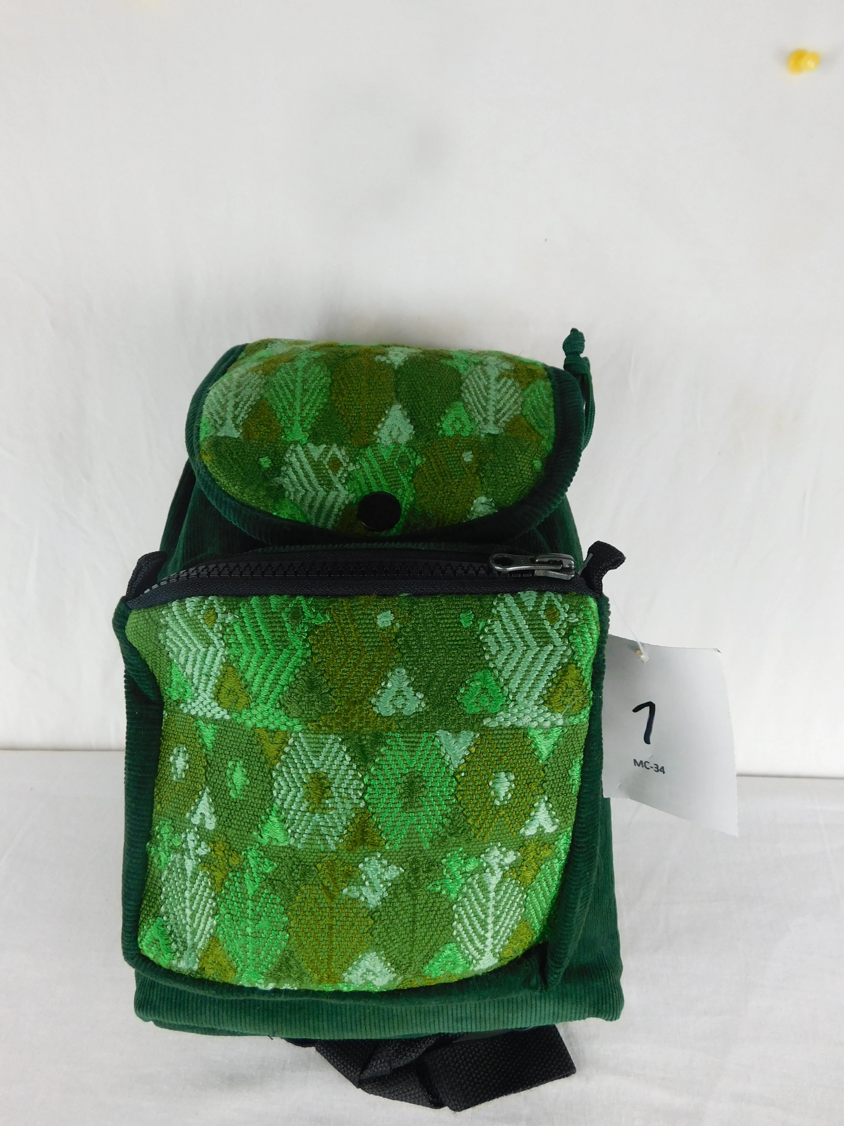 Mini backpack in corduroy with hand brocaded accents
